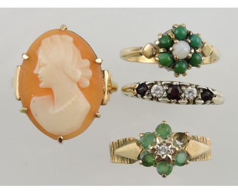 A 9ct yellow gold carved shell cameo ring decorated with a female profile, together with a 9ct jade and opal ring and two fur