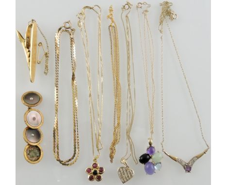 A collection of 9ct, 18ct and yellow metal jewllery including a tie clip, diamond set heart pendant, amethyst brooch, assorte