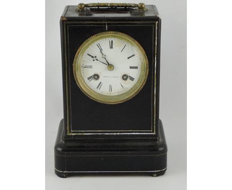 A mid-19th century French ebonised mantel clock, Le Roy Paris, the white enamel dial set out in Roman numerals in an ebonised