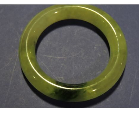 A jade bangle, D. 8cm.
