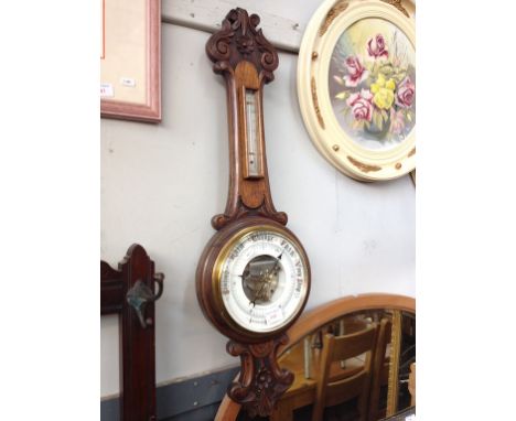 CARVED OAK ANEROID BAROMETER. L86CM
