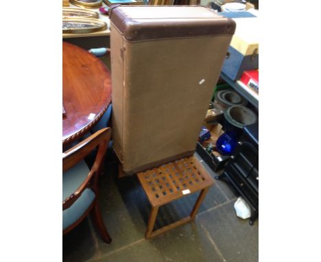 A VINTAGE TRUNK AND SMALL TABLE
