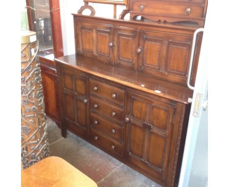 ERCOL DARK ELM COURT CUPBOARD. W146CM