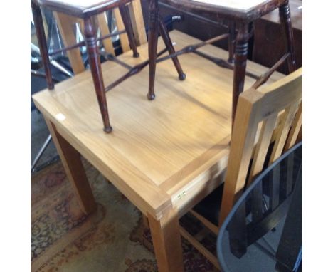 LIGHT WOOD SQUARE EXTENDING TABLE AND TWO CHAIRS.
