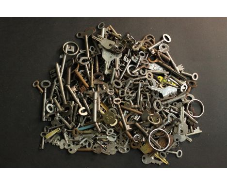 A large collection of vintage and antique keys and key labels. 