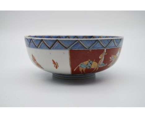 A 19th century Japanese Imari ceramic footed bowl. Decorated with peaches, flowers, birds and a warrior and his horse.  H.10 