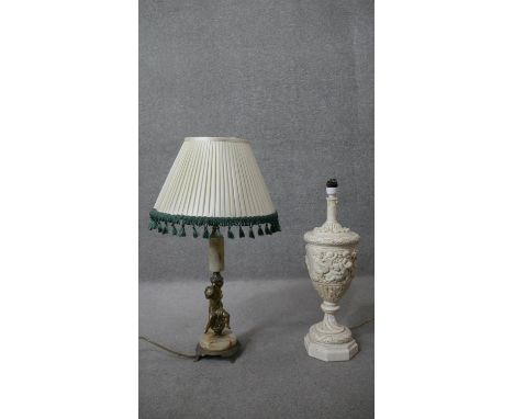 Two classical style table lamps. One vintage alabaster and gilt spelter cherub lamp along with a relief plaster lamp on hexag