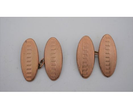A pair of 9 carat rose gold engine turned decorated chain link cufflinks. Hallmarked: Chester. Weight  5.7g 