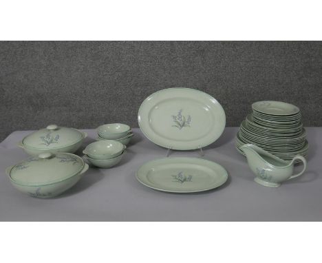 A Spode 'Flemish Green' eight person part dinner service. The set decorated with blue bell design. (approx 40 pieces total) W