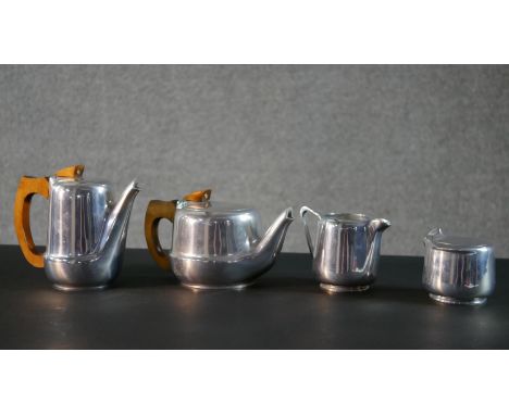 A mid-century Picoware four piece polished aluminium coffee and tea set with teak handles, makers mark to the base. H.17 W.17