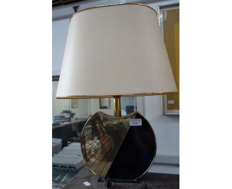 A FRENCH ART DECO STYLE BLACK AND GOLD TABLE LAMP