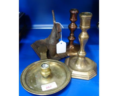 A 19TH CENTURY TIN WALL HUNG OIL LAMP, an early 19th century brass candlestick and similar metalware (4)