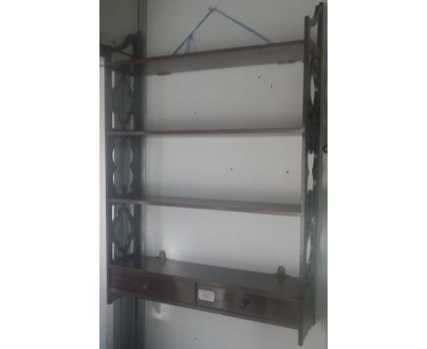 A PAIR OF CHIPPENDALE STYLE MAHOGANY OPEN WALL SHELVES, with fretwork sides, each fitted two drawers, each 68cm high x 48cm w