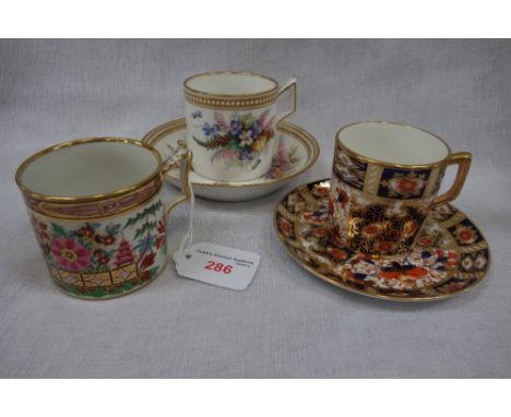 A VICTORIAN ROYAL WORCESTER CABINET CUP AND SAUCER, another similar and a cabinet cup