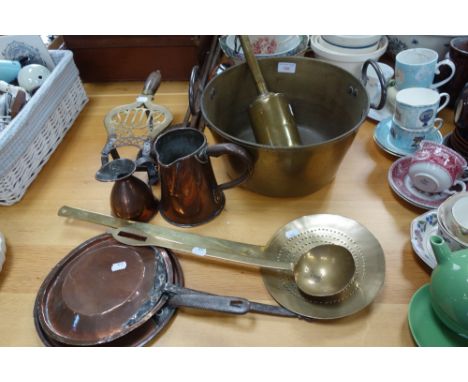 A BRASS PRESERVE PAN, a clockwork spit jack, brass ladle, skimmer, trivet and other items