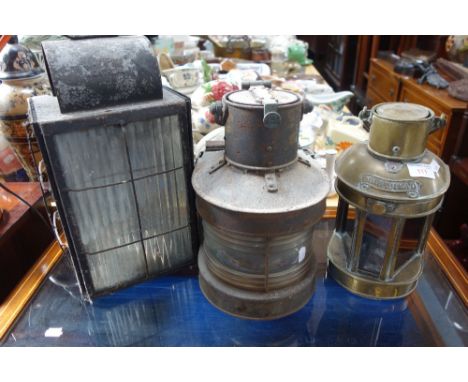 A BRASS MAST HEAD LAMP (converted to electricity) and two other ship's lamps