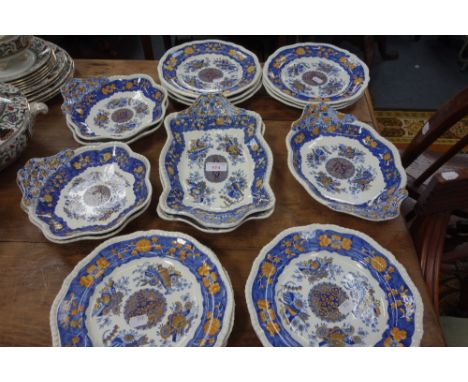 A 19TH CENTURY SPODE TRANSFER PRINTED DESSERT SERVICE in Trophies pattern with cracked ice and prunus border