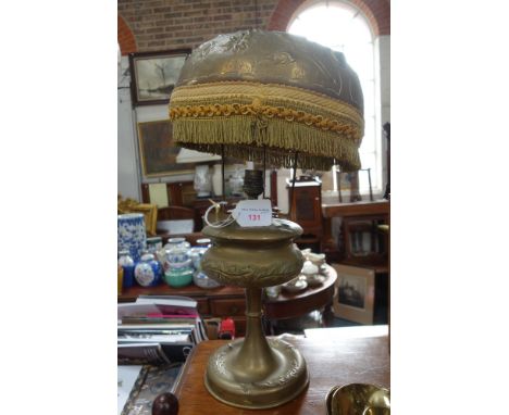 A FRENCH BRASS OIL LAMP (converted to electricity) with original shade with coloured cabochon decoration