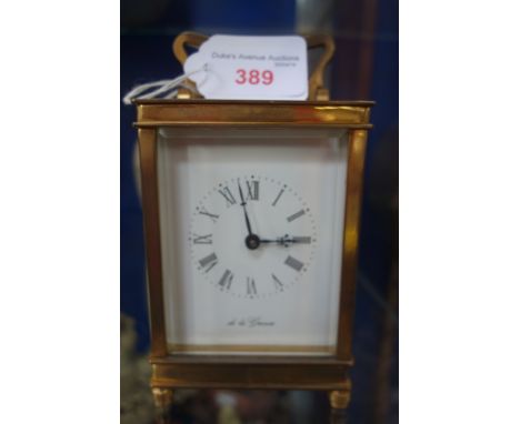 A BRASS CASED CARRIAGE CLOCK