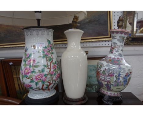 A CHINESE ENAMELLED VASE fitted as a lamp and two others similar