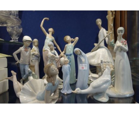 A LLADRO TABLE LAMP in the form of a woman playing a lute and a further collection of Lladro, Nao and other figures