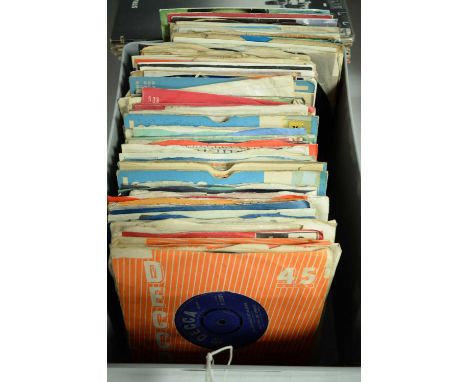 Selection of vinyl 45s, artists to include: The Rolling Stones, Fleetwood Mac, The Bee Gees, and others.