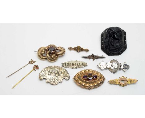 Victorian and later gold, silver, and rolled-gold brooches and stick pins, including; two 9ct gold bar brooches, three silver