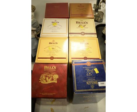 Seven Bell's Scotch Whisky Christmas decanters; Bell's Extra Special Old Scotch Whisky Royal Commemorative Golden Jubilee dec