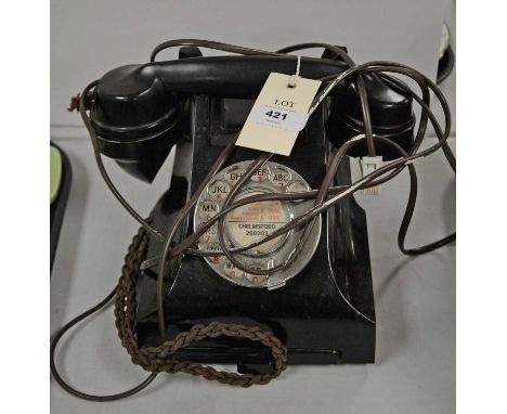 Vintage black bakelite telephone.