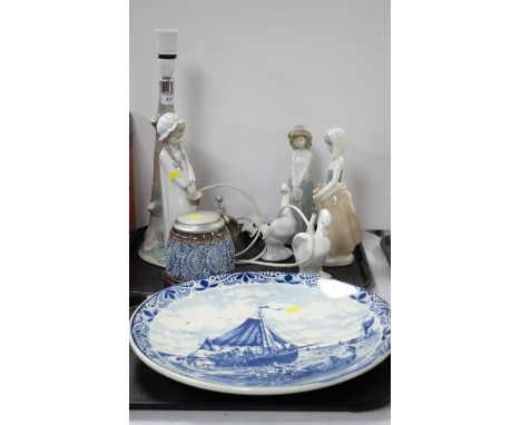 Nao figural table lamps, 42cms high; Nao figure of a girl; two Nao geese figures; another figure of a girl; modern Delft blue