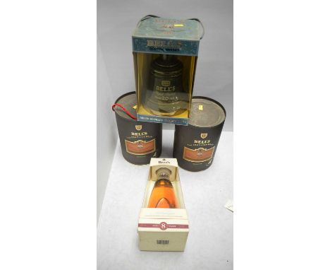 Two Bell's Fine Old Scotch Whisky decanters, 12 Years Old, each in tube; Bell's Extra Special Millennium whisky, 8 Years Old,