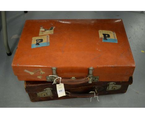 Vintage leather travel trunk; and another vintage travel trunk, each approximately 56cms wide. (2)