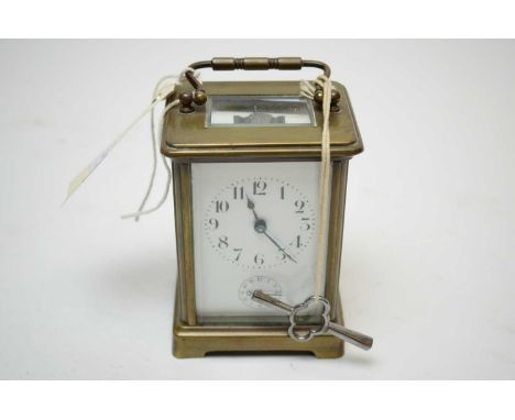 Early 20th Century brass carriage clock, 12cms high. 