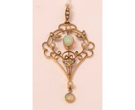 An Edwardian Art Nouveau opal, seed pearl, and yellow-metal openwork pendant, 3.8g gross.