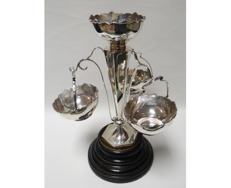 A three branch silver basket-epergne, the centre column of tapering vase-form, Walker &amp; Hall Sheffield, 1913, 33ozs gross