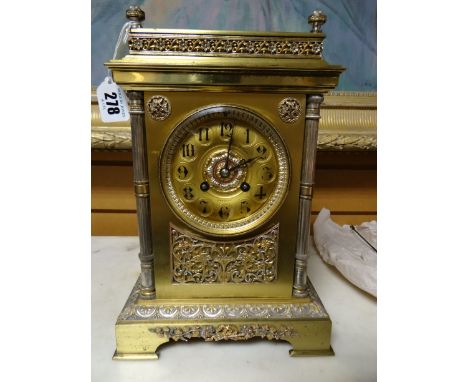 A mid-nineteenth century gilt-metal French movement mantel clock with Vincent, Paris medallion, striking to a gong, on bracke