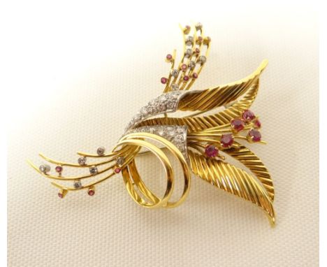 An 18ct yellow gold, ruby and diamond spray-brooch, diamonds tested, gold unmarked but stated as 18ct gold on purchase receip