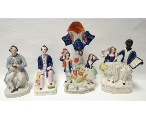 Nine nineteenth century Staffordshire figures or figural groups including Uncle Tom and R Cobden