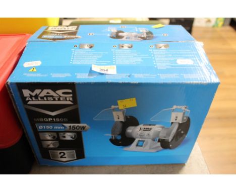 A boxed Macallister bench grinder