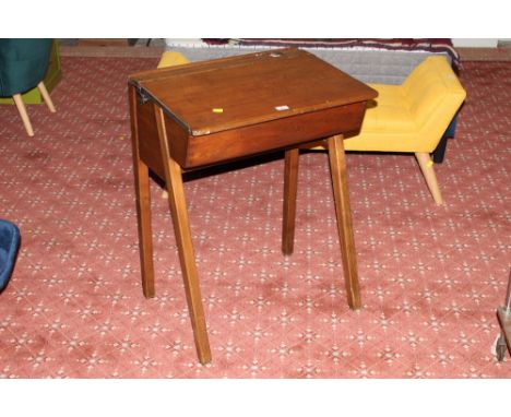 A vintage school desk with integral inkwell, 76 cm tall x 62 cm wide 