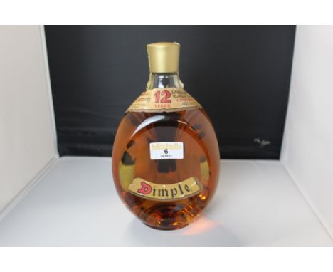 A 75 cl bottle of John Haig and Co Ltd Dimple blended Scotch whiskey, aged 12 years