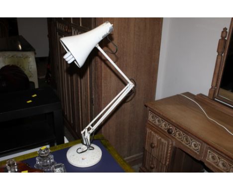 An enameled metal anglepoise lamp 