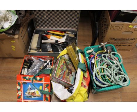 A bag of tools, electrical items, paint brushes and taps etc.
