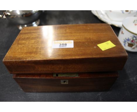 A 19th century mahogany tea caddy with 2 divisions