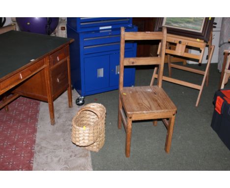 A pine ladder back dining chair together with a wicker basket 