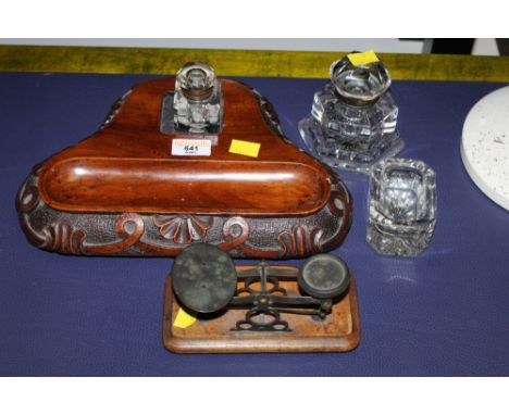 A Victorian mahogany desk stand and a set of scales with weights 