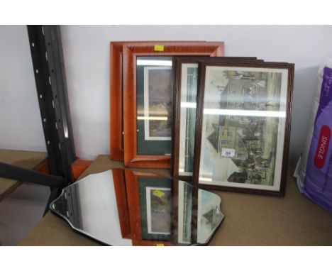 A frameless shaped mirror together with hunting scene prints 