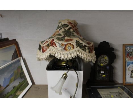 A decorative metal desk lamp with glass shade and a box of other lamps with floral shade 