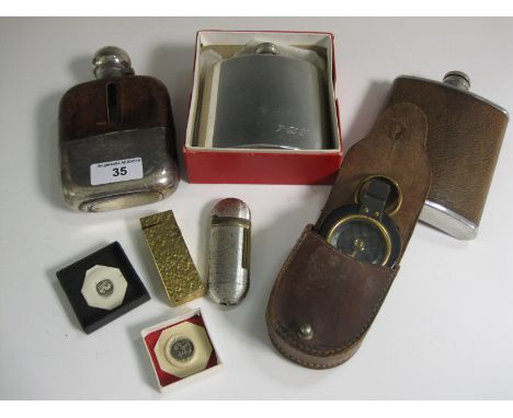 A George V silver mounted and lidded glass and leather Spirit Flask, Sheffield 1929, two modern Hip Flasks, Compass, Cigarett