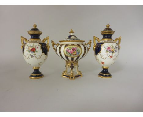 A pair of Coalport two handled Vases and Covers painted floral bouquets, blue and gilt surrounds, 7in, both A/F and a Royal C